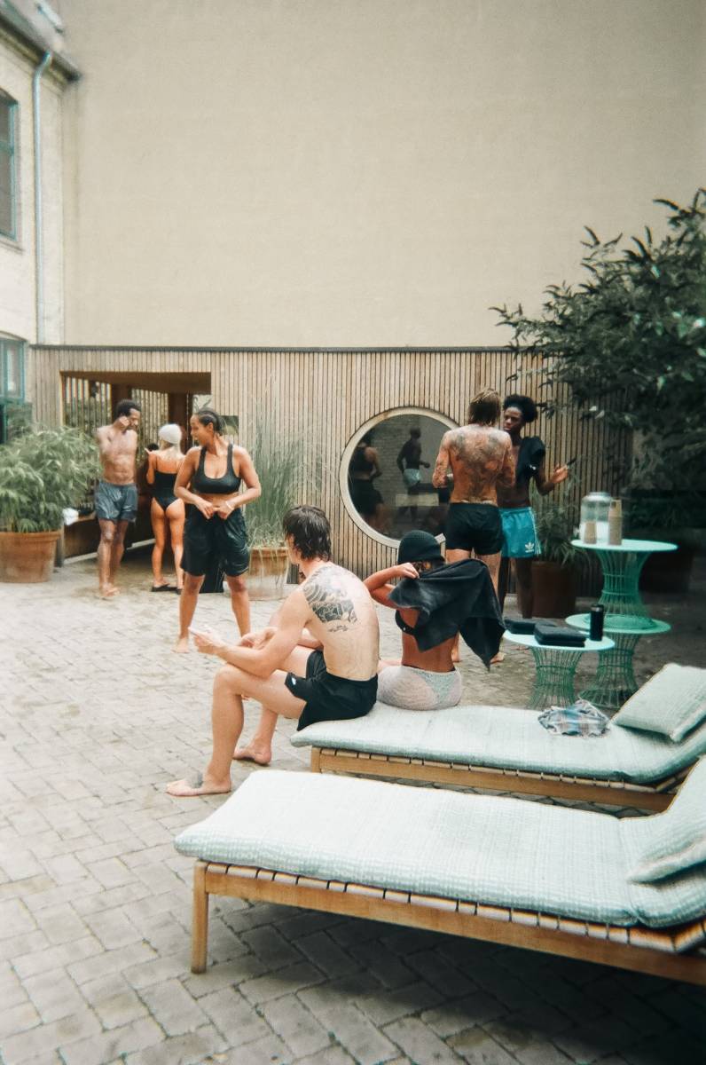 People gathering in a wellness courtyard